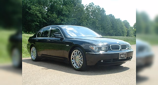 Для чего нужна заслонка в глушителе BMW 7-Series 2002 года