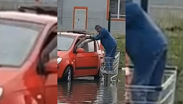 Ростовский водитель переплыл затопленную парковку на продуктовой тележке
