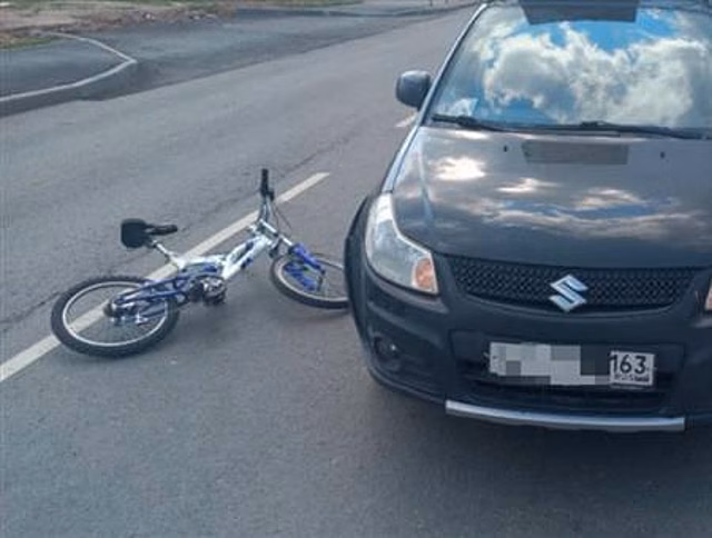 На ул. Дыбенко 10-летний велосипедист попал под колеса авто