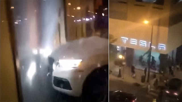 Видео: вандалы в США вломились в салон Tesla на Audi