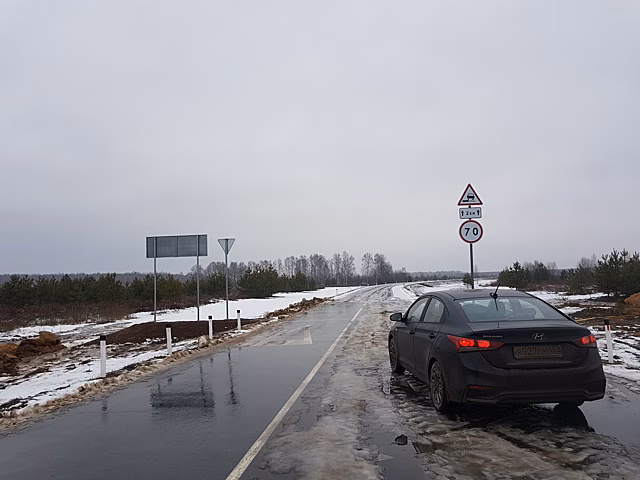 Вместо проезда по полю жители деревни Городное получили новую асфальтовую дорогу