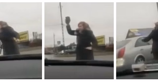 Большая очередь на границе заставила женщину взять булыжник и держать водителей в страхе