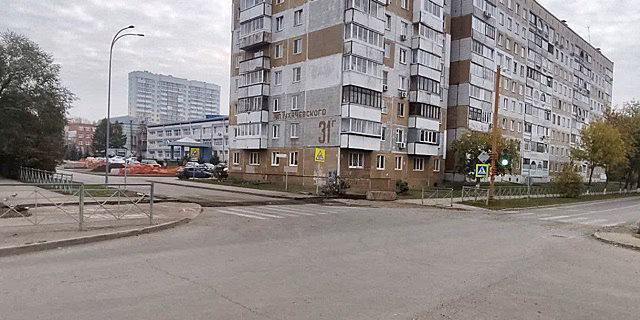 Рабочие открыли проезд по улице в заискитимской части Кемерова на два дня раньше срока