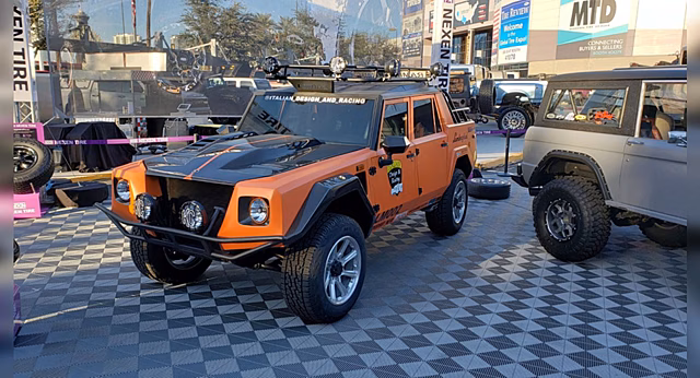 Редкий Lamborghini LM002 оснастили турбодизелем Cummins, чтобы перевозить старые Ferrari
